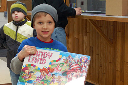 Little Boy With Candy Land Board Game